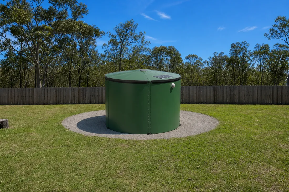 A finished My Tank Co modular tank on a rural property